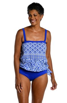 Model is wearing a blue and white multicolored mediterranean tiled printed bandeau blouson tankini top from our Grecian Tile collection. Blue Tankini With Upf 50+ For Poolside, Blue Sleeveless Tankini With Upf 50+, Blue Tankini With Upf 50+ For Beach Season, Blue Upf 50+ Tankini For Beach Season, Blue Printed Tankini For Poolside, Printed Blue Tankini For Pool, Blue Printed Tankini For The Pool, Blue Tankini With Upf 50+ For Beach, Blue Upf 50+ Tankini For The Beach