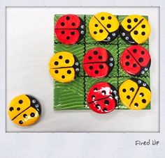 the ladybugs are painted on top of each other in different colors and shapes