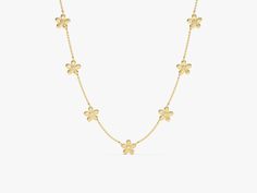 Crafted from solid 14-karat gold, Diamond Flower Station Necklace features a delicate chain adorned with charming flower-shaped stations, each embellished with sparkling diamonds. The floral design adds a touch of femininity and whimsy to the necklace, while the diamonds provide a dazzling brilliance. FEATURES • Made to Order • Gold Kt: 14k Solid Gold, 18k Solid Gold • Gold Color: Rose Gold, Yellow Gold, White Gold • Available Length Range: 14 Inches - 20 Inches (Custom lengths are also availabl Yellow Gold Flower Necklace With Adjustable Chain, Yellow Gold Flower Pendant Necklace With Adjustable Chain, Delicate Yellow Gold Flower Necklace With Delicate Chain, Delicate Yellow Gold Flower Necklace, Flower Station, Delicate Chain, Station Necklace, Diamond Flower, Sparkle Diamonds