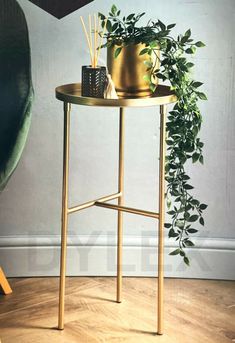 a small table with a potted plant on it