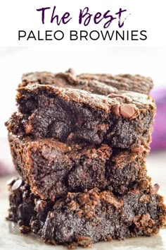 chocolate brownies stacked on top of each other with text overlay that reads the best paleo brownies