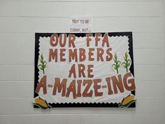 a sign that says our fa members are a - maizeing on the side of a wall