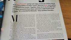 an article in a magazine about the history of rock and roll band oasis on wood table