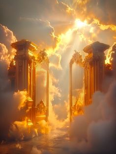 two golden gates surrounded by clouds with the sun shining through them in front of them