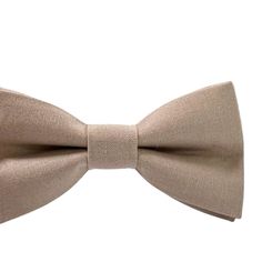 Your guy will be the talk of the party when he arrives sporting this stylish taupe bow tie!  Bow ties are the perfect accessory for groomsmen, ring bearers, page boys, matching Dad and Son outfits, or family pictures.  This bow tie coordinates perfectly with  Birdy Grey's Taupe color. This 100% cotton bow tie is double layered and reinforced with interfacing so it will hold its form well.  The children's bow ties come on an adjustable elastic neckband.  See images.  If you would like a clip, ple Brown Summer Bow Tie, Classic Brown Bow Tie For Groom, Classic Brown Bow Tie For Wedding, Brown Satin Bow Tie For Wedding, Groomsmen Ring, Son Outfits, Birdy Grey, Ring Bearers, Suspenders Men