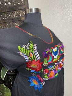 "Beautiful hand embroidered dress! This has been made and brought directly from Chiapas, Mexico. The embroidery is 100% handcrafted. All the work on this dress has a professional skilled finish and the multicolor embroidered makes it look even more eye catching. The embroidery work is made with great quality thread. The eye catching will be on the embroidered work, which is exquisite looking. Beautiful and clean work! Very light weight and fresh looking. SINCE THESE ARE EACH HANDMADE, EMBROIDERY Multicolor Embroidered Dress For Fiesta, Traditional Multicolor Floral Embroidered Dress, Short Sleeve Multicolor Embroidered Dress For Fiesta, Multicolor Embroidered Short Sleeve Dress For Fiesta, Cotton Embroidered Floral Dress For Fiesta, Cotton Floral Embroidered Dress For Fiesta, Traditional Multicolor Dress With Machine Embroidery, Multicolor Embroidered Cotton Dress For Fiesta, Multicolor Embroidered Hem Short Sleeve Dress