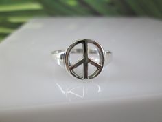 Sterling silver PEACE SIGN ring. Sleek, simple design...with the PEACE SIGN saying everything needed. Face height = 12mm. Stamped 925. Peace Sign Ring, Floral Studs, Boho Hippie, Star Ring, West Palm, Funky Jewelry, Peace Sign, Silver Stars, Sterling Silver Bands