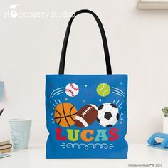 "Personalized Sports Theme Tote Bag ♥ ITEM DESCRIPTION Personalized Design (shown above) printed onto a 100% polyester ♥ SIZE: Small 12.99\"H, Medium 16.02\"H and Large 17.99\"H Handle height: 11.81\"H ♥ CHECKOUT INSTRUCTIONS: ► STEP ONE: Pick a Tote Bag Design and fill in the personalized information for your order. 1.) First Name **IF CUSTOMER FAILS TO LEAVE A NOTE WITH THE GRAND KID'S NAMES. THIS AREA OF THE DESIGN WILL BE LEFT BLANK.** ► STEP TWO: Add it to your cart & Checkout ORDER PROCESS Personalized Playful Blue Bag, Playful Personalized Blue Bag, Fun Multicolor Bags For Outdoor Activities, Sporty Personalized Sports Bag, Personalized Sporty School Bag, Sporty Personalized School Bag, Multicolor Sporty Bags For Sports, Personalized Sporty Bags For Sports Events, Sporty Personalized Bag For Sports Events