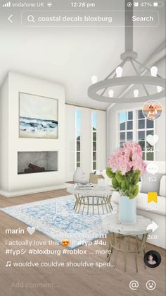 an image of a living room with flowers on the coffee table in front of it