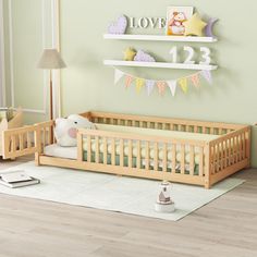 a baby's room with a crib and toys