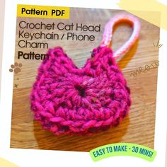 the crochet cat head keychain / phone charm pattern is easy to make