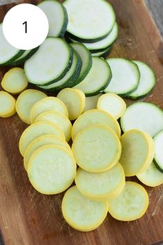 sliced cucumbers on a wooden cutting board with text overlay reading how to cut zucchini