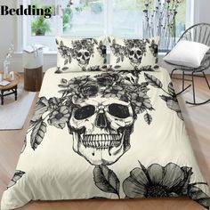 a bed with a skull and flowers on it