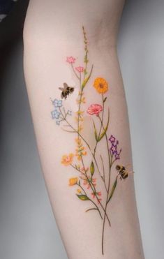 an arm with flowers painted on it