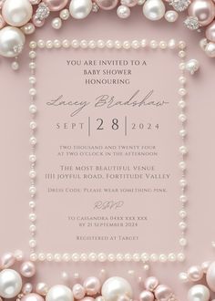 a pink and white baby shower with pearls on the bottom, in an ornate frame