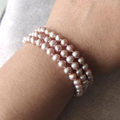 Welcome to my shop my dear friend. I hope you will like my jewelry, and most of my jewelry are made by myself. Please see the detail for this item: Pearl Jewelry: bracelet material: cultured freshwater pearl color: white pink & lavender Size: around 6-6.5 mm length: can choose if you want other length, can tell me please! want to match necklace, also can tell me please. About shipping: I will send out your order in 1-3 business days from China. 1, To United States, will use US E-packet shipp Pink Pearl Jewelry With 8mm Beads, Elegant Pink Pearl Beaded Bracelets, Pink Akoya Pearl Wedding Jewelry, Elegant Pink Pearl Bracelet With 8mm Beads, Pink 8mm Beads Jewelry For Wedding, Delicate Pink Pearl Bracelet With Round Beads, Elegant Pink Pearl Bracelet With Round Beads, Elegant Pink Pearl Bracelet As A Gift, Delicate Pink Pearl Beaded Bracelet