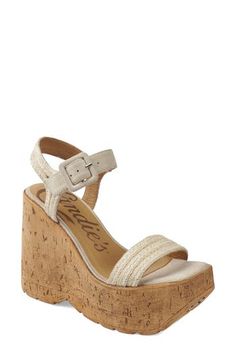 A cork-textured platform-wedge sole amplifies the earthy vibes of an outfit-making sandal topped with a woven ankle strap. 5" heel; 2" platform Adjustable ankle strap with buckle closure; hidden elastic inset Textile upper/leather lining/synthetic sole Imported Cork Wedge Heel Sandals For Vacation, Cork Wedge Sandals For Vacation, Cork Wedge Heel Sandals For Summer, Cork Wedge Sandals For Summer, Summer Cork Wedge Sandals, Spring Beach Wedge Sandals With Cork Material, Summer Open Toe Cork Wedge Sandals, Summer Cork Wedge Sandals With Open Toe, Summer Ankle Strap Cork Sandals