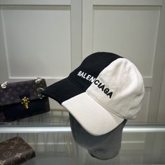 SHOP MORE LUXURY PRODUCTS HERE Description Balenciage Logo Cap Black/White Cap Black/WhiteCotton drillClassic baseball cap shapeAdjustable velcro tab at back Includes box, dust bag.This product is of the premium quality. White Snapback Visor Hat With Letter Print, White Letter Print Snapback Visor Hat, White Letter Print Visor Snapback Hat, White Visor With Curved Brim For Outdoor, White Curved Brim Visor For Outdoor, White Outdoor Visor With Curved Brim, Trendy White Snapback Hat With Curved Visor, White Curved Visor Hat With Letter Print, White Baseball Cap With Letter Print And Curved Visor