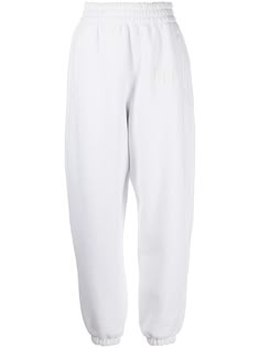 white cotton-blend logo print to the front elasticated waistband two side slit pockets rear welt pocket elasticated ankles Sweatpants White, White Track Pants Outfit, White Track Pants, Luxury White Sweatpants For Streetwear, White Sweatpants With Elastic Side Panels For Streetwear, Luxury White Sweatpants With Pockets, Alexander Wang Sweatsuit, Alexander Wang Sweatpants, Alexander Wang Pants