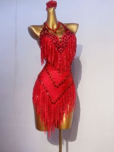 a mannequin with red sequins on it