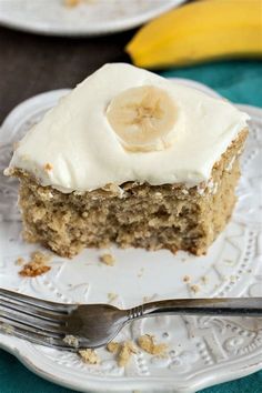 a piece of banana cake on a plate with a fork