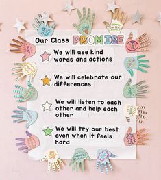 a bulletin board with handprints on it that says, our class promise we will use kind words and actions