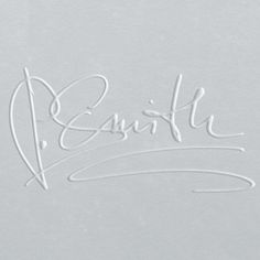 the word beautiful written in cursive white paper