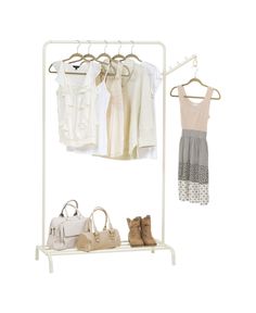 clothes and handbags are hanging on a white rack with two hangers, one in front of the other