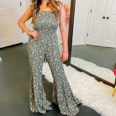 This Is Such A Gorgeous Green Floral Jumpsuit. It Comes With Adjustable Tie Spaghetti Straps. The Bottoms Of The Pants Are Loose And Wide And Sooo Gorgeous!! Sleeveless Floral Print Jumpsuits, Sleeveless Non-stretch Floral Jumpsuits And Rompers, Spring Floral Print Strapless Fitted Jumpsuit, Casual Fitted Strapless Jumpsuit With Floral Print, Fitted Floral Print Strapless Jumpsuit, Glitter Romper, Olive Green Jumpsuit, Flowy Jumpsuit, Yellow Romper