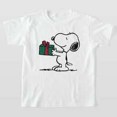 a white t - shirt with a cartoon character holding a present box