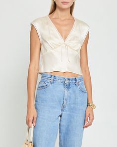 Silk Tops With Lace Trim For Daywear, Chic V-neck Lace Top For Daywear, Feminine Satin Top With Lace Trim, Feminine Satin Top For Summer, Satin Lace Top For Spring, Feminine Satin Lace Top, Chic Cropped Crop Top For Daywear, Elegant Cropped Blouse With Lace Top, Elegant Cropped Lace Blouse