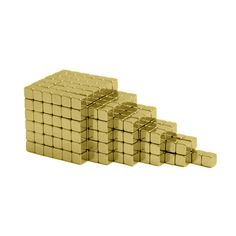 several gold cubes stacked on top of each other in front of a white background