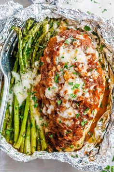 baked meatloaf in foil with asparagus and parmesan cheese