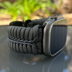 "Handcrafted with 100% Nylon Paracord \"MADE IN USA\".   Our Products include:    ➖Custom handcrafted watch bands \"According to You\". No matter how small or big your wrist size, we will craft your perfect fitting band (wrist size picture measurement required).  ➖Variety of styles to choose from. You may order your band \"As pictured\", or feel free to request changes. If you don't see your favorite style in our page or watch category yet, please contact us and we can discuss your options.  ➖Variety of buckles or clasps (Prices may vary).  ➖FREE FIRST CLASS USPS SHIPPING FOR DOMESTIC U.S. ORDERS (Includes U.S. Military APO/FPO Address Overseas).  Please, refer to policies for handcrafting time frames https://www.etsy.com/shop/Cording2U#policies. These may vary month to month depending on Paracord Watch, Handmade Watch Bands, Apple Watch Sizes, Handmade Watch, Veteran Owned Business, Apple Watch Series 1, Military Veterans, Business Thank You, Us Military