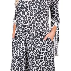 Another Simply Southern original. This pom sleeved dress has pockets! You'll love wearing it alone or over leggings or jeans. Cross Front Top, Leopard Dress, Sleeved Dress, Simply Southern, Snow Leopard, Womens Tees, Pom Pom, Active Wear, Long Sleeve Dress