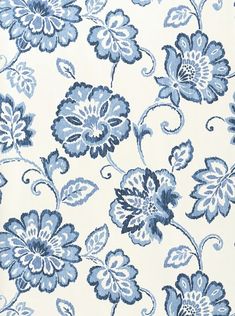 a blue and white floral pattern on fabric