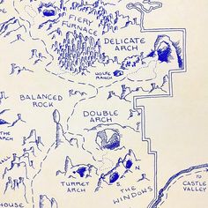 a map drawn in blue ink shows the location of many different places on earth, including mountains and lakes