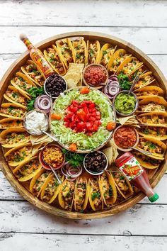 a platter filled with lots of different types of food