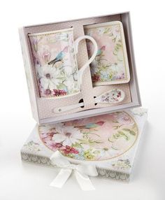 two cups and saucers in a gift box