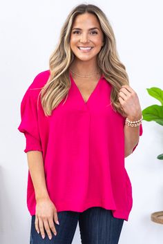 Product Details Colors: Pink Print: Solid Neckline: V-Neck Sleeve: 3/4 Sleeves Hemline: Straight Brand: Umgee Material and Care 100% Polyester Hand Wash Cold Hang/Line Dry Size and Fit Small: Bust 66" Waist 64" Length 26.5" Medium: Bust 68" Waist 66" Length 27" Large: Bust 70" Waist 68" Length 27.5" Photo model is 5'7 and wearing a size small Video model is 5’8 and wearing size small Summer V-neck Blouse With Smocked Cuffs, Pink V-neck Blouse With Blouson Sleeves, Pink Blouson Sleeves V-neck Blouse, Spring V-neck Blouse With Elastic Sleeves, Spring V-neck Tops With Cuffed Sleeves, Photo Model, Large Bust, Small Bust, Pink Print