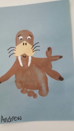 a drawing of an animal with the name andrew on it's chest and feet