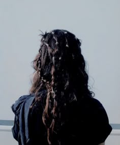 the back of a woman's head with long hair