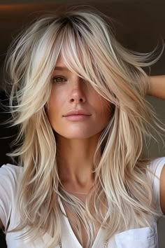 29 Long Layered Hair With Curtain Bangs Styles That Turn Heads Long Layered Hair With Middle Part, Long Length Shag Haircuts With Bangs, Middle Part Hairstyles Curtain Bangs, Heavy Baylage Blonde, Long Parted Bangs, Long Hair With Chunky Layers, Medium Length Hair Long Bangs, Blonde Medium Hair With Bangs, Face Framed Bangs