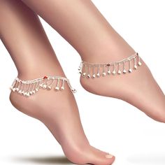 Indian silver anklet payal pair in hanging beads in a wave pattern that makes the loud jungling sound. Bells are in the S hook only. Fits and sits like a curve on the ankles as shown. Comes as a set of 2 anklets. Metal : Alloy Plating: Silver Finish Length: 9.56 Inch plus S Hook Clasp: 0.56 Inch Width:0.88 Inch Twist one end of the S Hook clasp to open it. Slide the S Hook in the eye at the other end of the anklet. Press firmly to close it Indian silver anklet payal pair in hanging beads in a wa Adjustable Anklets With Latkans For Festive Occasions, Adjustable Festive Anklets With Latkans, Bohemian Festive Anklets With Silver Beads, Festive Bohemian Silver Beads Anklets, Festival Anklets With Silver Beads, Silver Anklets For Puja, Silver Beaded Anklets For Festival, Silver Beaded Festival Anklets, Festival Silver Beaded Anklets