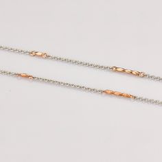 Platinum Chains by Jewelove Designer platinum chain for women. Metal : Platinum with Rose Gold Platinum Purity : 95% Gold Purity : 18 k (75%) Platinum Purity Mark : Pt 950 Gold Purity Mark : 18K / 750 Estimated Weight : 6.44 g ( for 18 inches ) (3.56 grams Platinum + 2.88 grams Gold) Length : 16 / 18 inches (can be customised on order) Certificate of Authenticity : Platinum Guild International Rose Gold Metal Chain Necklace, Rose Gold Delicate Chain Necklace, Delicate Rose Gold Metal Chain Necklace, Formal Rose Gold Metal Chain Necklace, Rose Gold Figaro Chain Necklace, Rose Gold Link Chain Bracelet With Delicate Chain, Rose Gold Rolo Chain Link Necklace, Delicate Rose Gold Metal Chain Bracelet, Gold Chain For Women