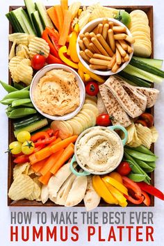 a tray filled with different types of food on top of a white table next to an instagram page