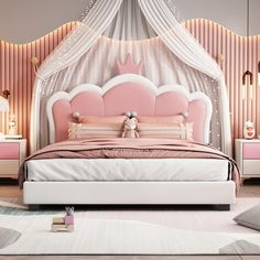 a pink and white bedroom with a bed, dressers, lamps and pillows on the floor