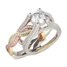 two tone gold and silver wedding rings with diamonds on the sides, set against a white background