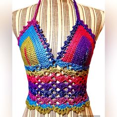 Handcrafted Made For A Size S. Cup Can Fit Up To A Size B Comfortably, Has Adjustable Straps, Which Can Fit Up To A Size M Around The Torso Prefect For Festivals/Concerts, The Beach, Or Any Fun Occasion. Match It With Denim Shorts, Any Skirt, Flowy Pants, Or Denim Jeans And You Will Be An Eye Catcher. Fitted Purple Crochet Top For Vacation, Purple Crochet Lace Top For Summer, Casual Purple Crochet Top For The Beach, Purple Crochet Top For Beach, Purple Crochet Beach Top, Bohemian Purple Crochet Top For Summer, Purple Bohemian Crochet Top For Summer, Fitted Multicolor Crochet Halter Neck Top, Multicolor Fitted Halter Neck Crochet Top