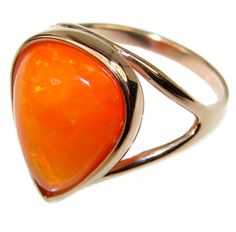 Handmade Unique 925 Sterling Silver ring with unique one of a kind Mexican Fire Opal,  6.30 grams of marvelous handcrafted jewelry design. Only one piece availble ready to ship! It's unique worldwide ring - simply piece of art in world of fine jewelry. California Dream Mexican Opal  18K Rose Gold over .925 Sterling Silver handcrafted Ring size 9  RING DETAILS: Weight: 6.30g; Size: 9; Ring Type: Statement; Material: Sterling Silver; Main stone: Mexican Fire Opal; Dimension: L - 3/4, W - 5/8, T - Pear-shaped Orange Jewelry Gift, Orange Pear-shaped Jewelry For Gifts, Unique Orange Jewelry For Anniversary, Orange Cabochon Jewelry For Anniversary, Orange Ring, Mexican Opal, Unique Silver Jewelry, Pear Shaped Ring, Handcrafted Rings